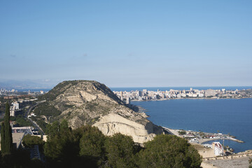 Fototapeta premium Scenic view of alicante's coastline with mount benacantil overlooking the mediterranean sea