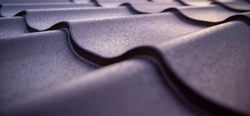 Textured metal roofing sheets with a wave pattern for durable construction