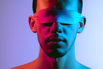 Mysterious Enigma: A man with blindfold is shrouded in vibrant, moody neon hues. A portrait of introspection, hinting at hidden depths and obscured truths.