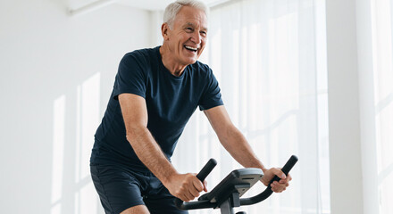 Senior Man Enjoying Workout on Exercise Bike