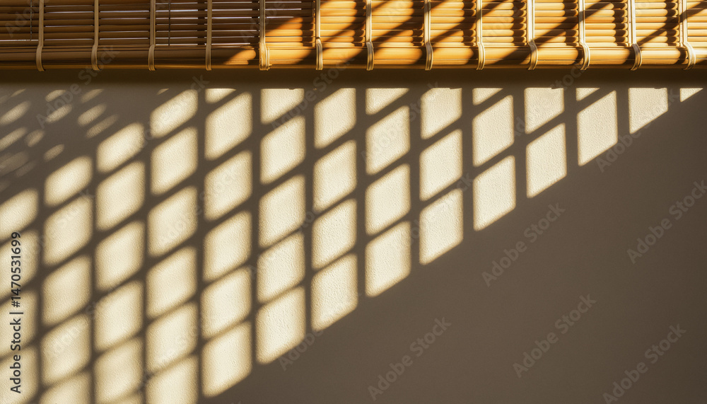 Poster sunlight streams through bamboo blinds, casting a striking geometric pattern of shadows across a tex