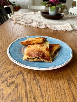 Homemade Alt ust boregi or Rumeli Borek on wooden table
