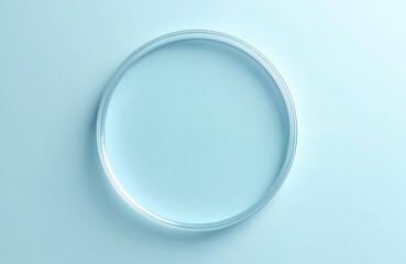 Empty round petri dish glass slide on blue background. Mockup for cosmetic product sample in scientific laboratory. Serum, oil, acid liquid testing, water hydration, skin care products, beauty
