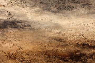 Earthy Abstraction: Textured earth tones form an abstract composition, evoking a sense of raw, organic beauty with a rough, tactile feel.