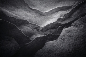 Shadowy Stone Sculptures: A monochrome landscape portrays the serene elegance of natural formations, as textures blend in graceful curves and patterns, bringing forth feelings of depth and intrigue.