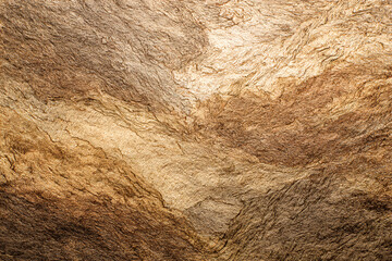 Texture of Sandstone: An abstract composition of sandstone texture. Natural patterns and warm colors that evoke the earth's timeless beauty.