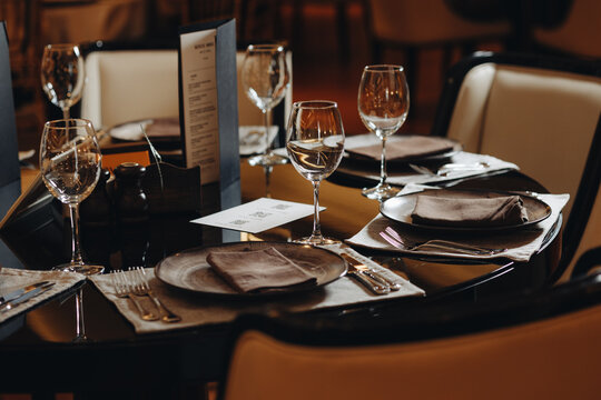 Elegant restaurant table setting with glasses