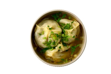 Manti (Manti or Manty) in thick meat sauce with herbs in a white bowl. A Central Asian dish.