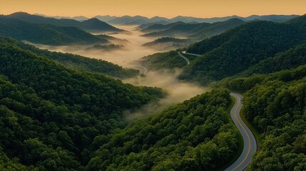 A Serpentine Road Winds Through Verdant Hills Embraced by Ethereal Mist
