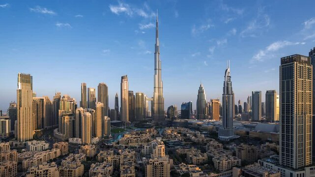 Dubai Downtown timelapse, sunrise over Burj Khalifa and other towers in Dubai, United Arab Emirates (UAE).