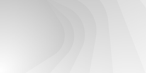 A soft gray gradient background of undulating curved lines. The image is smooth and minimalist with no harsh edges or distinct shapes.