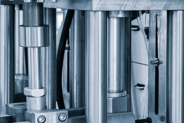 A large, industrial machine made of metal. It is comprised of many different parts, all of which...