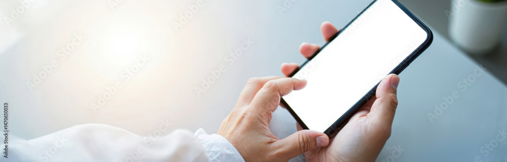 Poster Hands holding smartphone device with blank white screen. Person using mobile phone for communication or business. Mockup design for presentation of app. Digital tech concept.