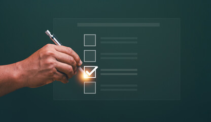Checking mark on checklist, Checklist and approve concept, Businessman using pen to tick correct...