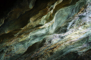 Cave Wall Textures: The intricate textures of a cave wall, with their organic forms and captivating light and shadow, are highlighted in a close-up view, revealing the natural beauty.