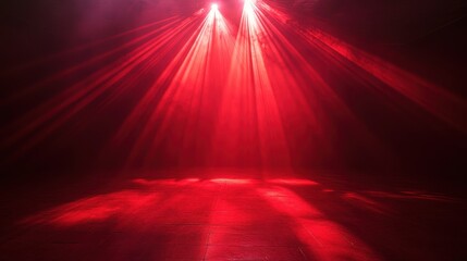 Vibrant Stage Lights: Red Spotlight Piercing the Dark for an Electric Show Experience