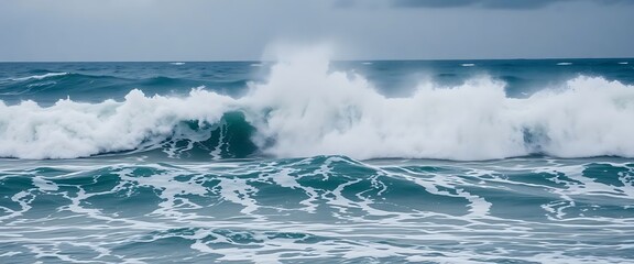 large wave crashing into the ocean on a cloudy day
