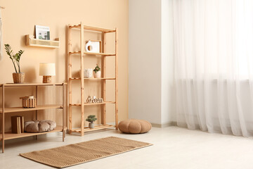 Wooden table and rack with decor in living room