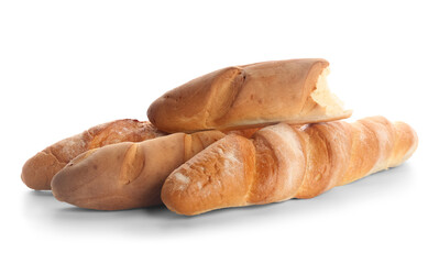 Many fresh baguettes on white background