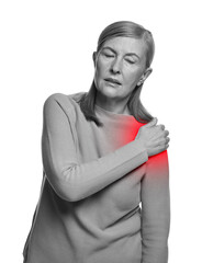 Arthritis. Senior woman suffering from pain in shoulder on white background. Black and white toning...