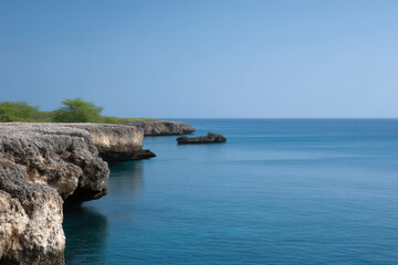 Fototapeta premium coastal cliff in jamaica with long shadows and geometric patterns