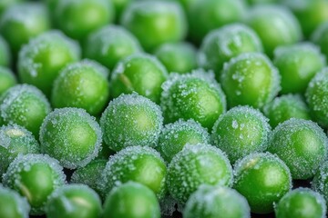 Close-up of fresh green peas covered with frost crystals showing texture and coldness in a natural arrangement