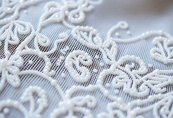 close up of a white lace on a fabric