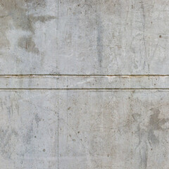 Gray abstract cracked concrete wall background.