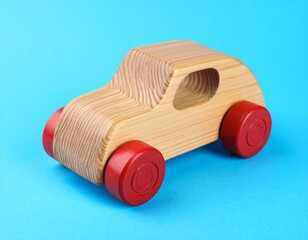 Fototapeta premium Wooden toy car on blue background