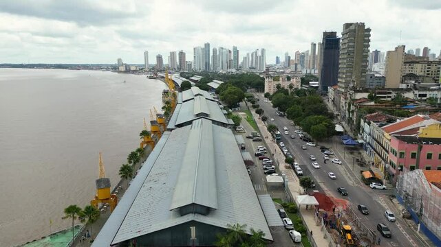 Aerial drone footage over "Estacao das Docas", a cultural, gastronomic, and tourist complex in Belem, Para, BR. The site restored three historic warehouses from the city's old port