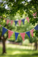 Festive Bunting Hanging Outdoors in a Park with Green Foliage