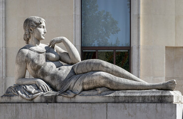 Lying Nymph sculpted by Auguste Guenot at Muse d'art oderne de paris. Femme allongee nue en pierre...