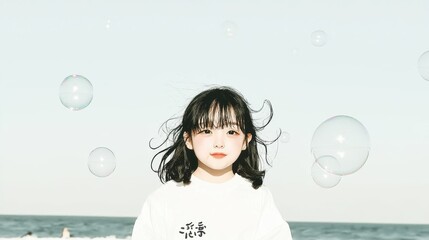 Child with bubbles on beach