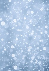 Fototapeta premium blurry photo of snow flakes on a blue background