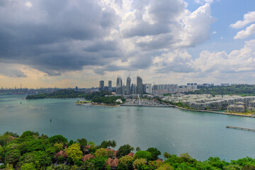 30 April 2025 view of Singapore mainland from Sentosa Island off the coast from Singapore harbour beautiful white sandy beach and crystal clear turquoise waters 