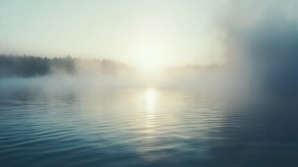 Fototapeta premium Calm waters and sunlight peeking through misty fog and a forest