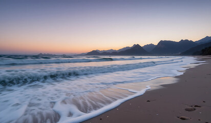 Fototapeta premium Serene beach scene at sunset, waves gently lapping the shore. Peaceful, tranquil coastal landscape.