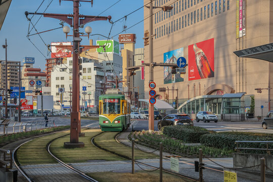 March 23 2025 Tram Passing in Front of an Urban Mizuho Building