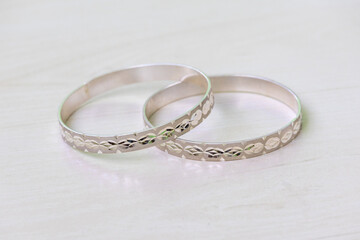 A pair of beautiful silver bangles, also known as Churi in Bangladesh, is an essential ornament for women. They are worn during festivals like Pohela Boishakh, Eid, and Puja, as well as at weddings.
