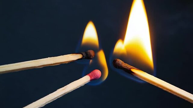 Burning matchsticks close up