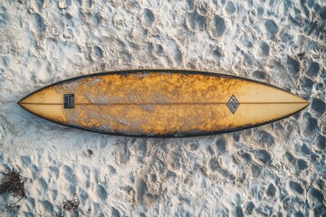 Vintage surfboard on sandy beach