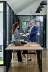 Happy business people smiling business man and  business women working together in office

