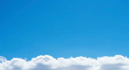 Obraz premium Clear sky with fluffy clouds