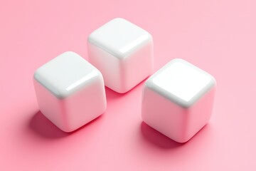 Three white cubes on a pink surface