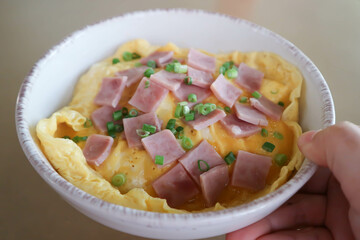 creamy omelet or omelet or omelette or fried egg with ham and green onion
