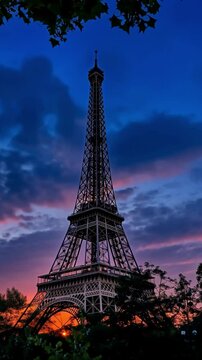 Experience the enchanting beauty of a golden sunrise over the eiffel tower, capturing the stunning colors of dawn as paris awakens. This video radiates warmth and tranquility.