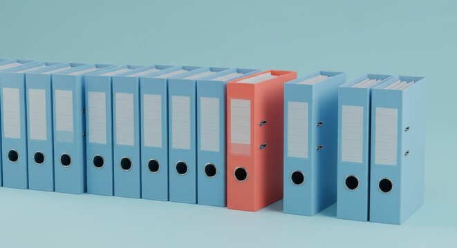 Row of blue ring binders with one contrasting orange folder
