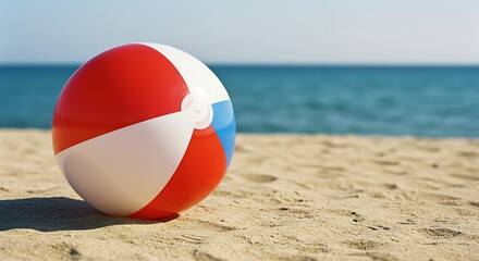 Obraz premium Beach Ball Bliss: Summer Fun on Sandy Shores