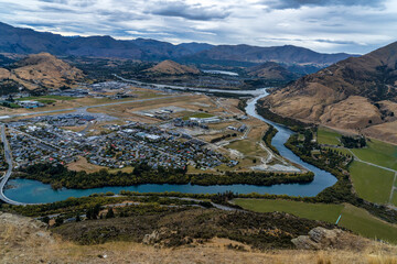 Panoramic scenery of the Queenstown and Wakatipu basin from a working deer farm above Kelvin Heights