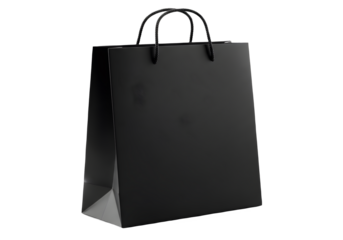 realistic black kraft paper shopping bag with twisted handles isolated on transparent background.
